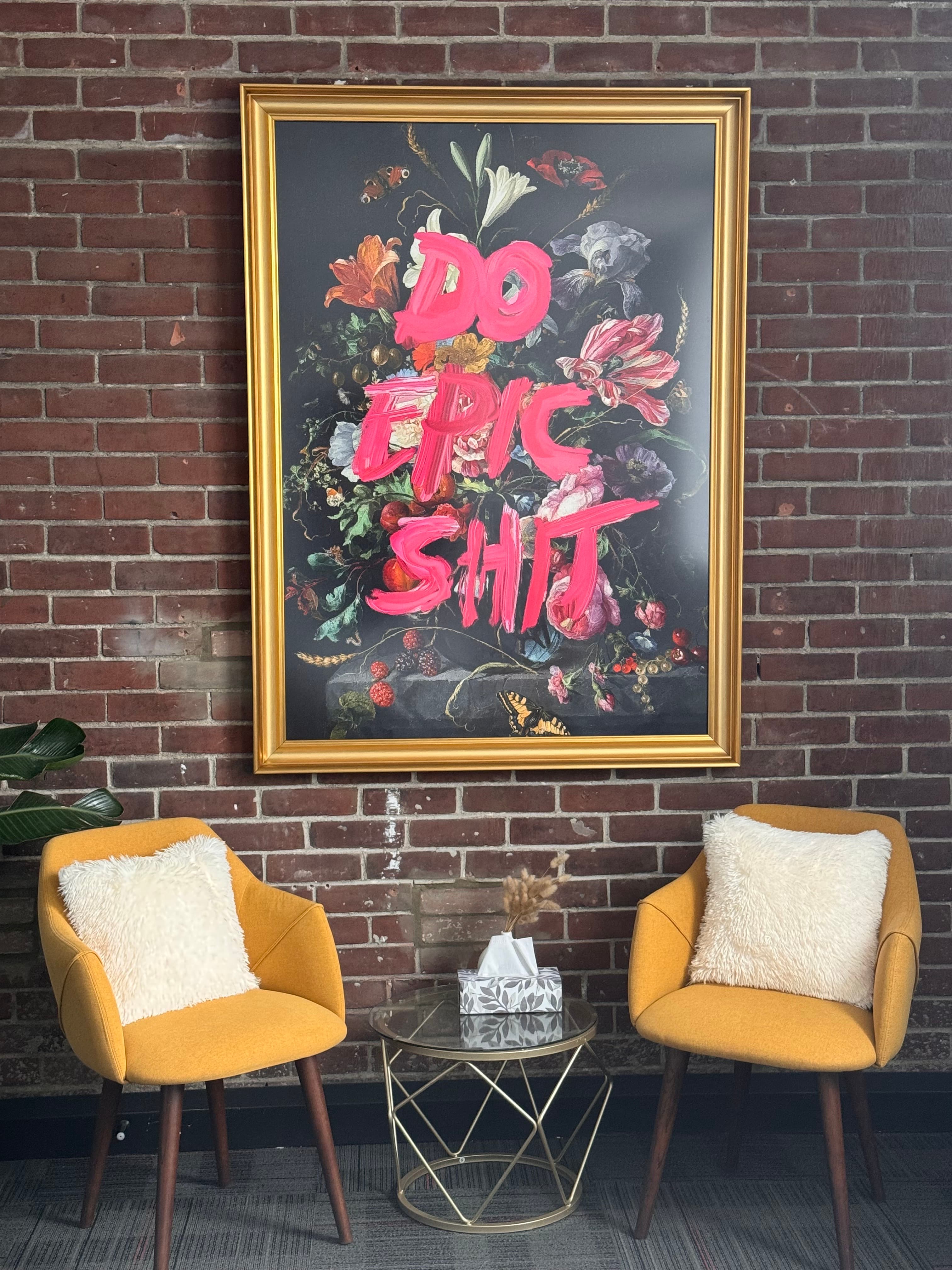 The Gallery — brick wall and bold art